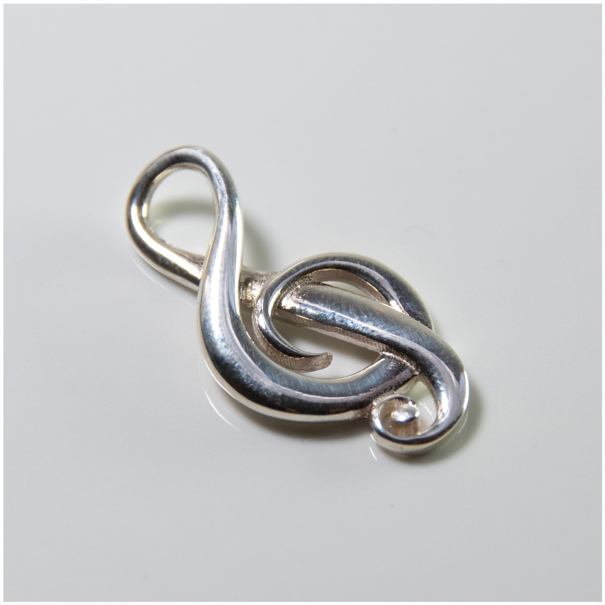 PL001 - Sterling Silver Music Note Pendant