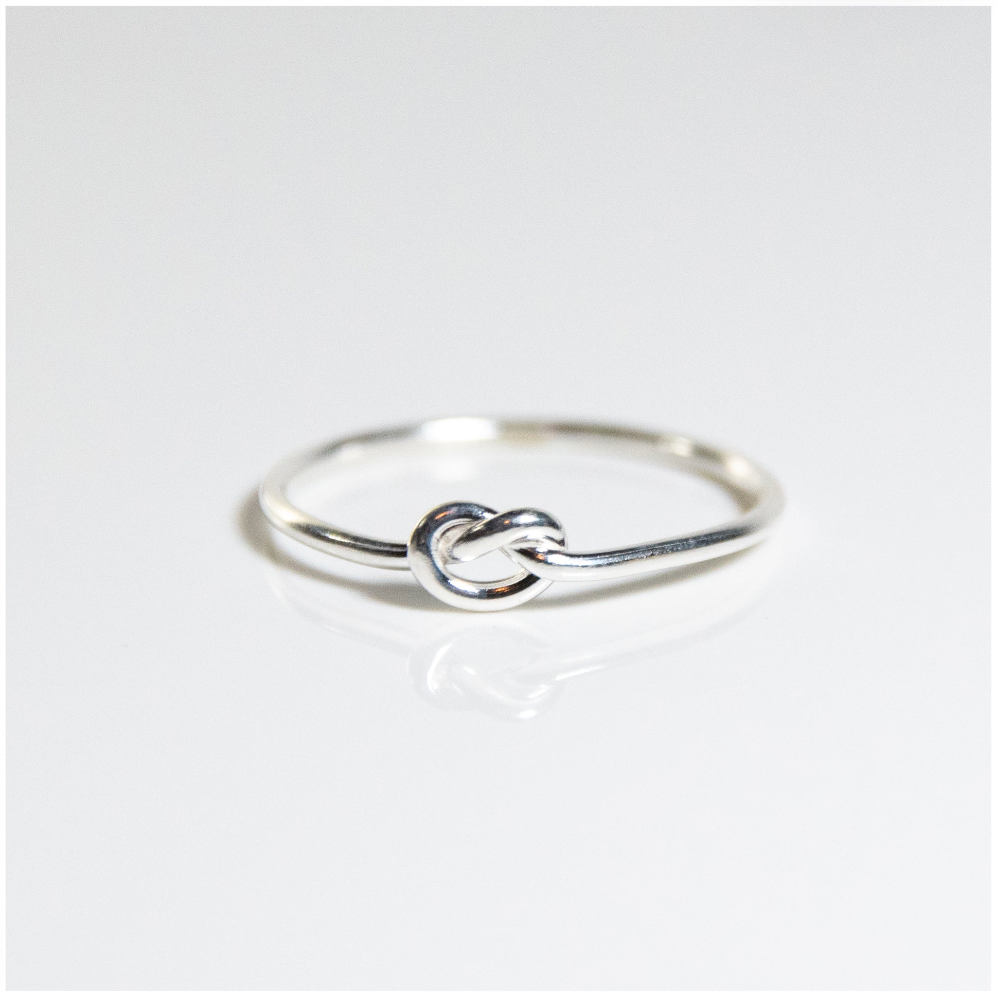 R050 - Sterling Silver Ring with Knot