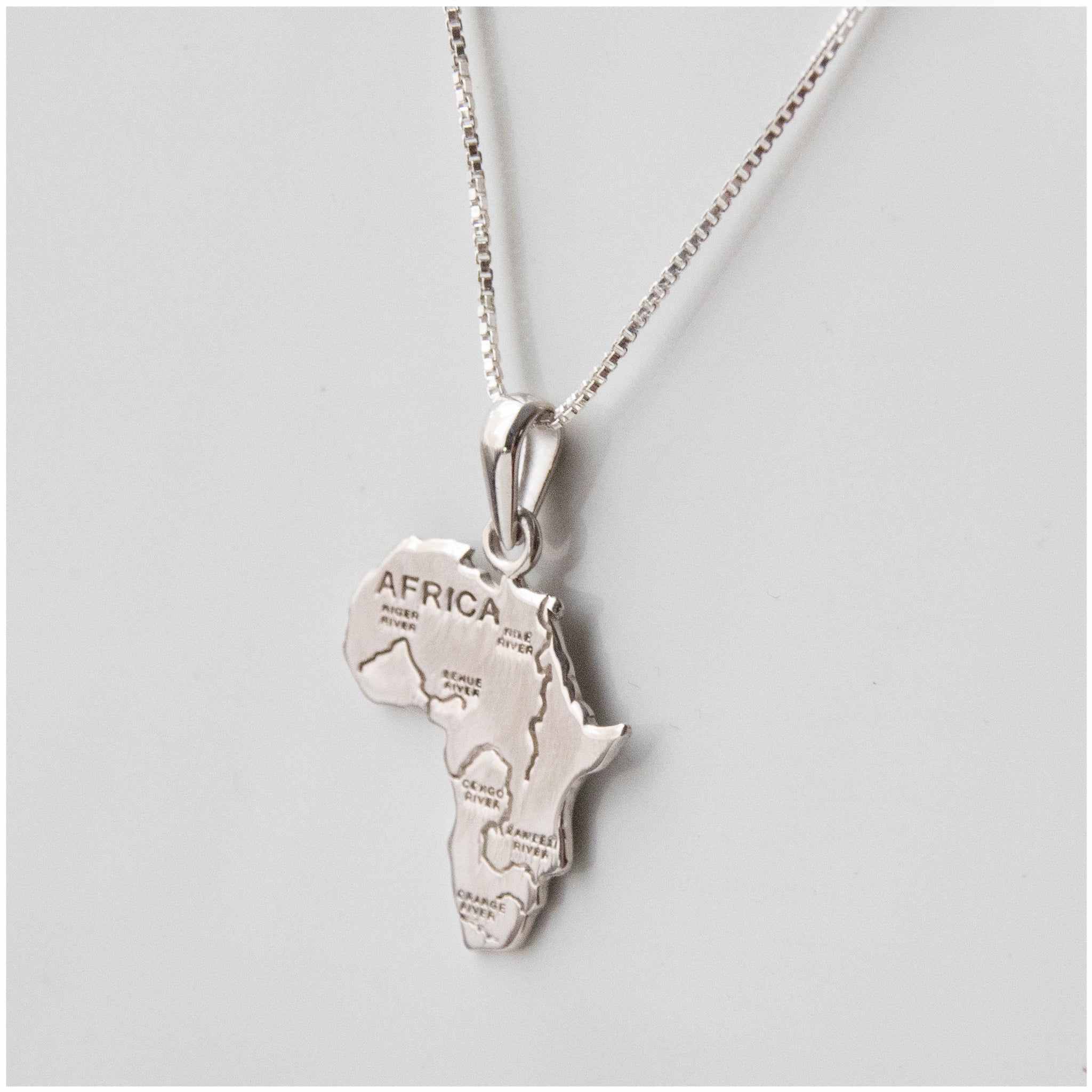 SP001C- Sterling Silver Africa Pendant & Chain